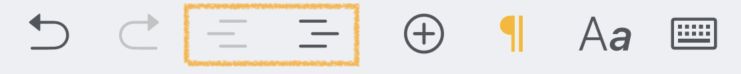 The indentation buttons in the bar above the keyboard